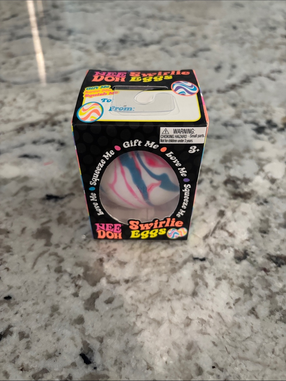 NWT, mint condition Schylling NeeDoh Swirlie Egg (pink and blue)
